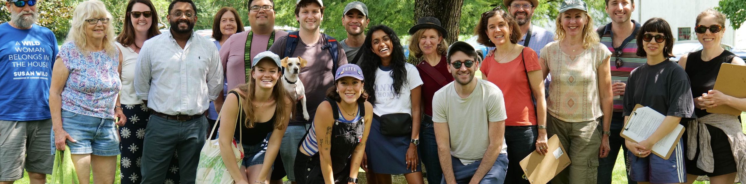 Anna Thomas standing in a large group of volunteers